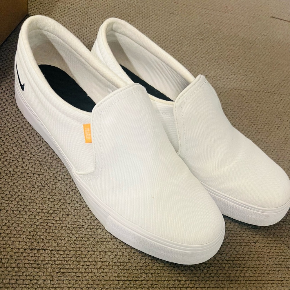 Nike women’s slip on size 9 white shoes